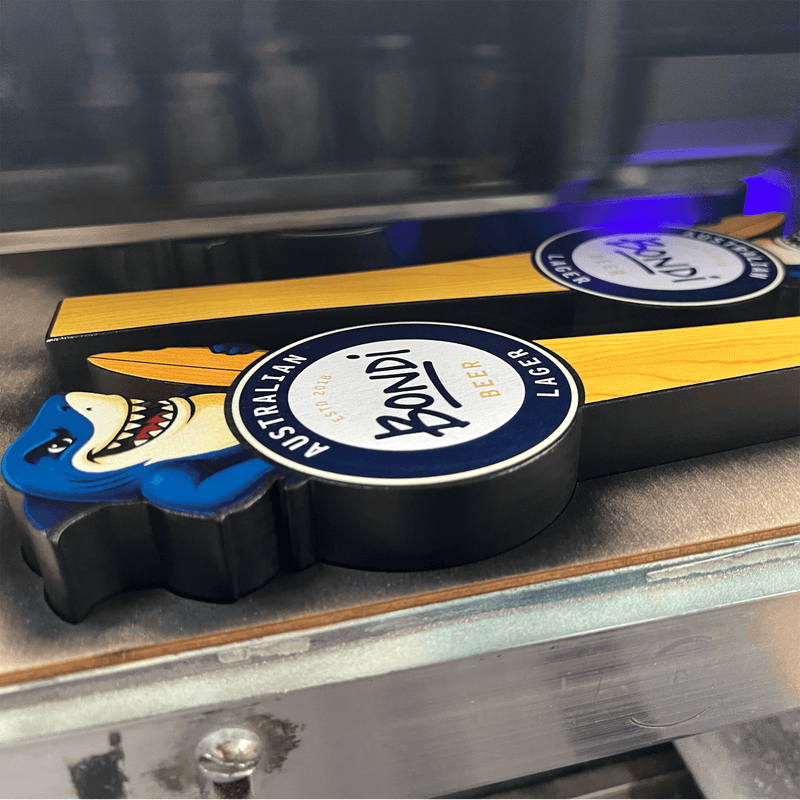 Add your art to the topper and handle shafts